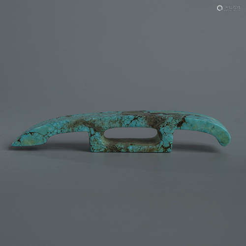 A Carved Turquoise Sword Fitting