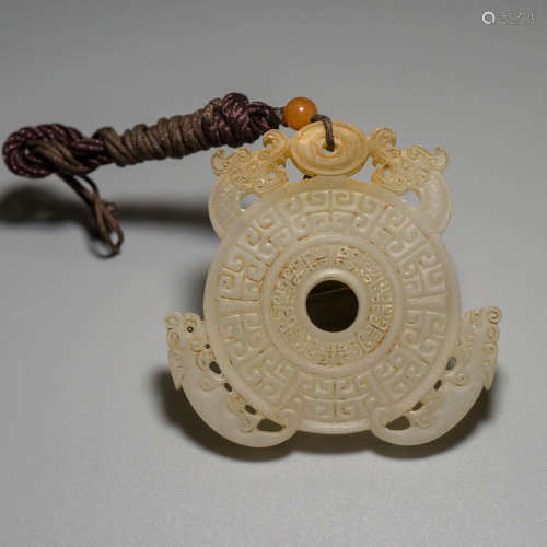 A Carved Jade Dragon Pendant