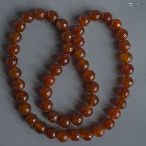 A String of Agate Buddha Beads