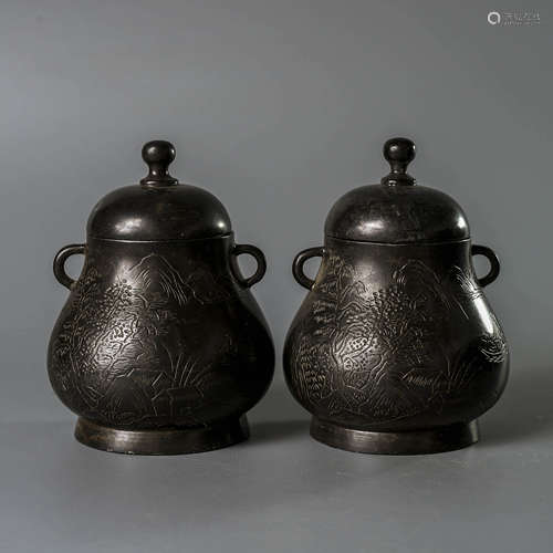 A Pair of Tin Caddies