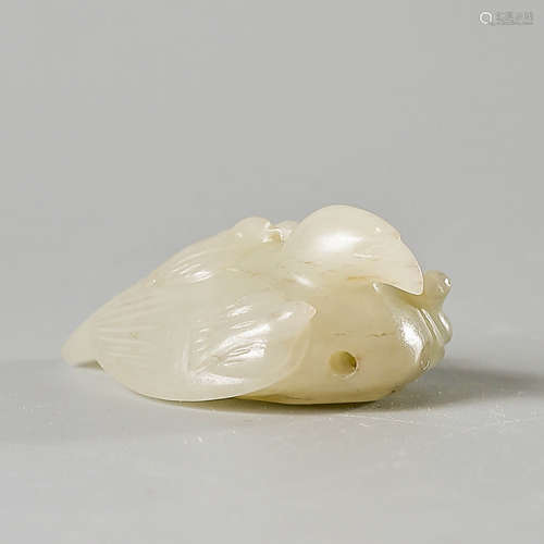 A Carved Hetian White Jade Eagle Ornament, with Natural Crac...