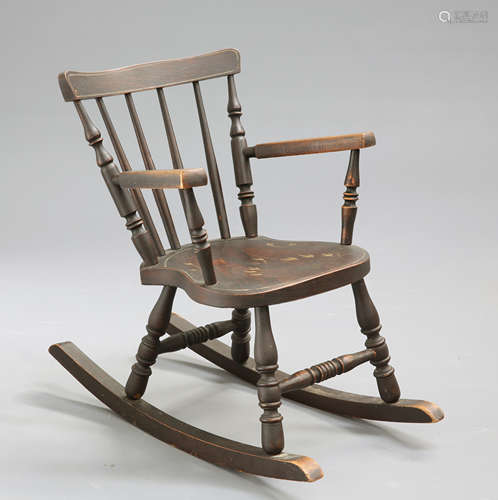 A 19TH CENTURY CHILD'S ROCKING CHAIR