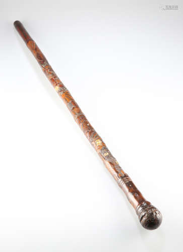 A 19TH CENTURY JAPANESE CARVED BAMBOO AND IVORY WALKING STIC...