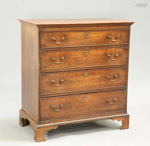 A GEORGE III OAK CHEST OF DRAWERS