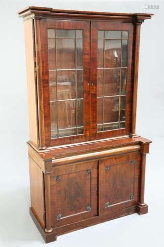 A VICTORIAN MAHOGANY BOOKCASE CABINET the upper section with...