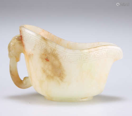 A SMALL CHINESE JADE LOW EWER