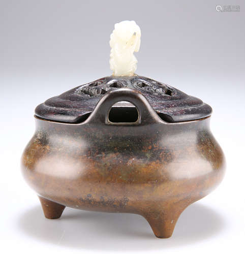 A CHINESE BRONZE TRIPOD CENSER