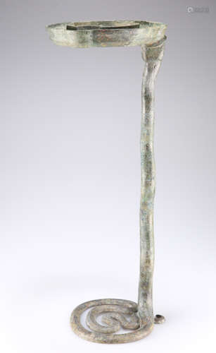 A RARE AND IMPORTANT ARCHAIC BRONZE SNAKE LAMP, WARRING STAT...