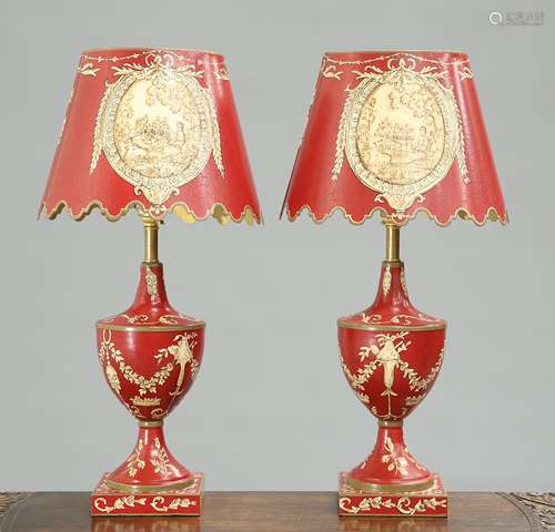 A PAIR OF PERIOD STYLE RED TOLE TABLE LAMPS