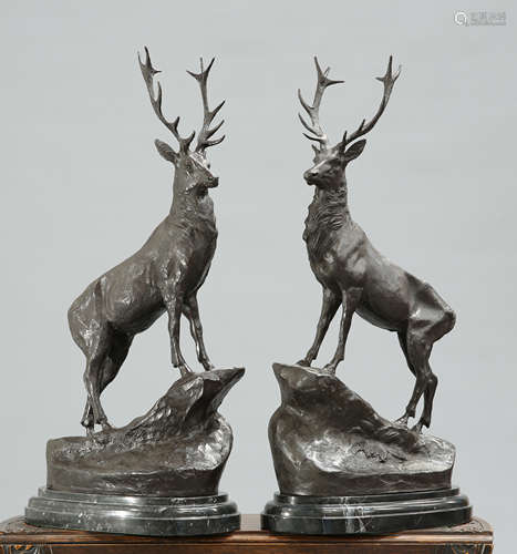 A LARGE PAIR OF BRONZE STAGS