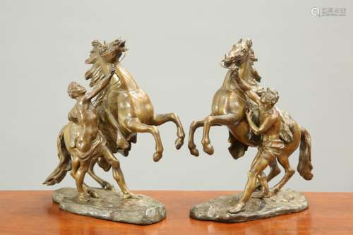 A PAIR OF 19TH CENTURY BRONZE MODELS OF MARLY HORSES