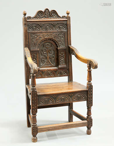 A 17TH CENTURY STYLE CARVED OAK JOINED CHAIR, 19TH CENTURY