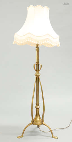 AN ART NOUVEAU BRASS TELESCOPIC STANDARD LAMP