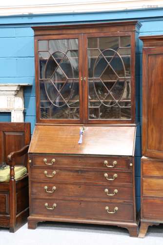 A GEORGE III MAHOGANY BUREAU BOOKCASE