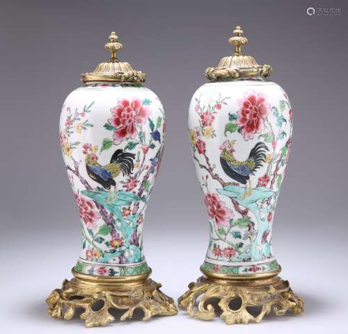 A PAIR OF CHINESE GILT-BRONZE MOUNTED PORCELAIN VASES AND CO...