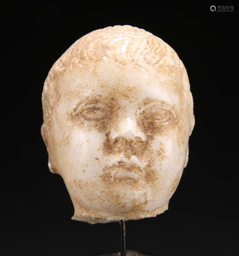 A MARBLE HEAD OF A CHILD