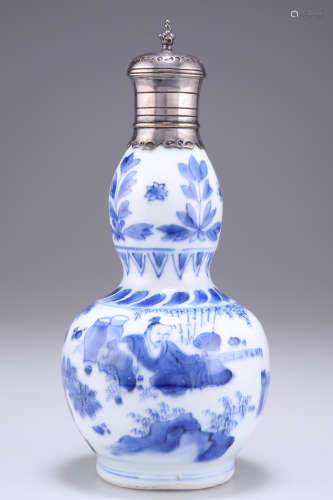 A SILVER-MOUNTED AND COVERED KANGXI BLUE AND WHITE DOUBLE GO...