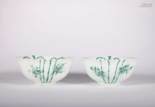 A pair of green glazed bowl