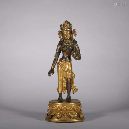 A gilt-bronze statue of Tara