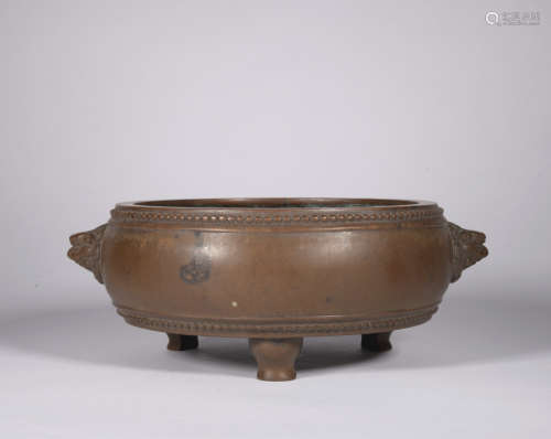 A bronze censer