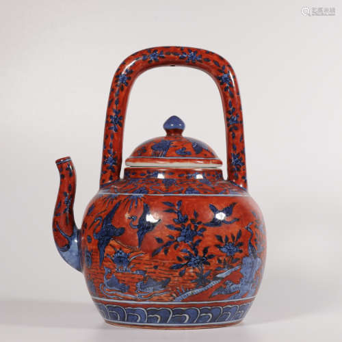 An underglaze-blue and copper-red teapot