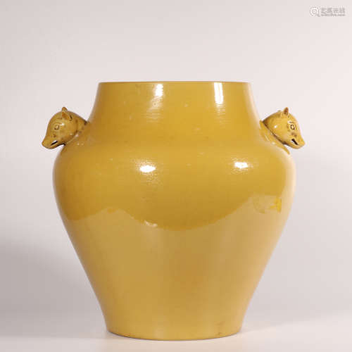 A yellow glazed jar