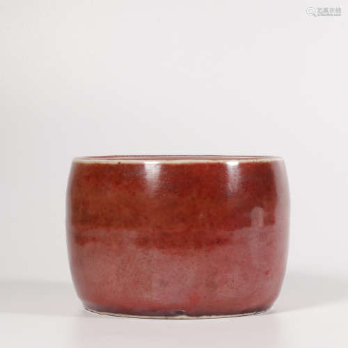 A red glazed jar and cover