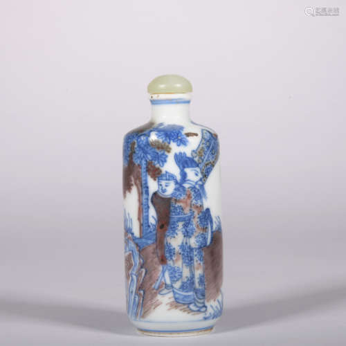 An underglaze-blue and copper-red 'figure' snuff bottle