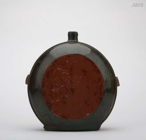 A carved lacquerware pot