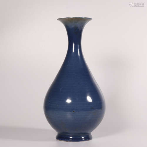 A blue glazed pear-shaped vase