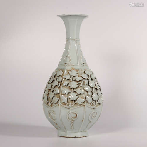 A white glazed pear-shaped vase