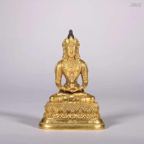 A gilt-bronze statue of Amitayus