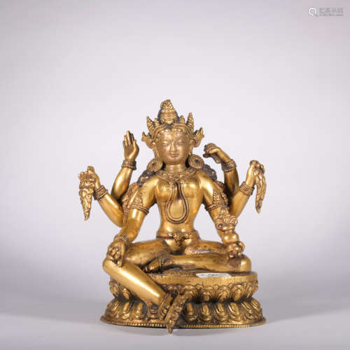 A gilt-bronze statue of Tara