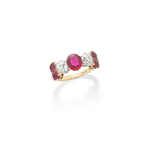 A RUBY AND DIAMOND HALF-HOOP RING