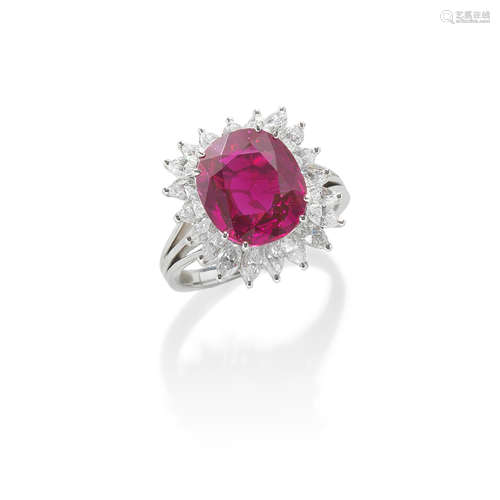 A RUBY AND DIAMOND CLUSTER RING