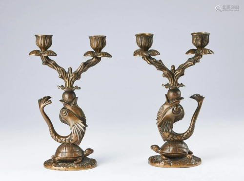 Wunderkammer A pair of cast bronze candlesticks shaped
