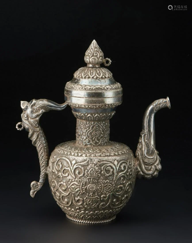 Arte Himalayana A silver embossed teapot Tibet, 19th