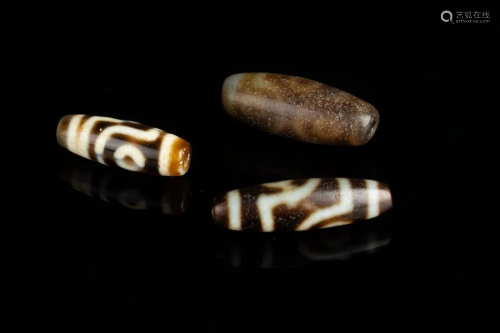 Arte Himalayana Three agate dzi .