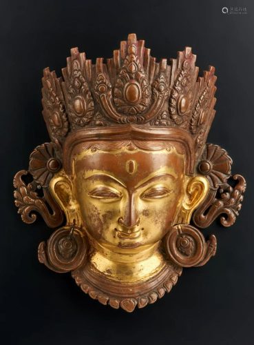 Arte Himalayana A gilded copper plaque embossed with