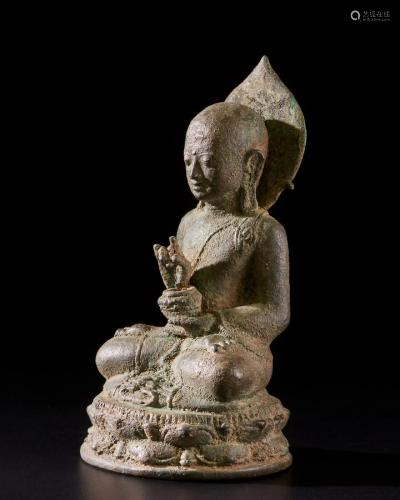 Arte Sud-Est Asiatico A bronze figure of a monk