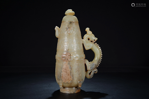 A russet jade carving of a wine vessel