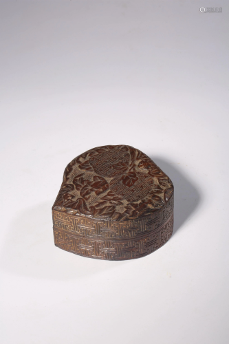 A Chinese peach-shape carved redwood box and cover