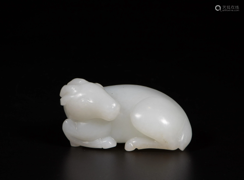 A Chinese white jade carving of a mythical beas