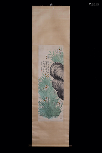 A Chinese scroll depicting flower rocks garden