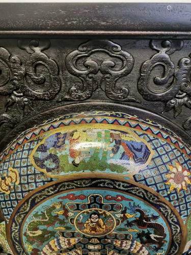 A Chinese cloisonnÃ© enamelled bronze round plaque