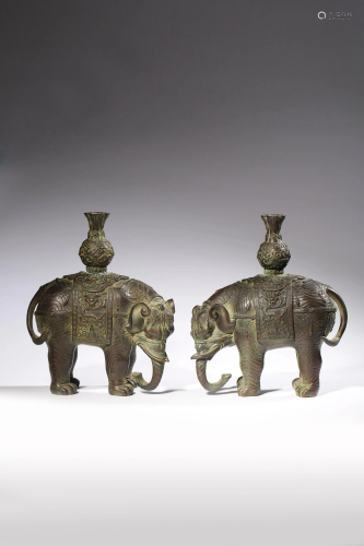 A pair of Chinese bronze elephant joss stick holders