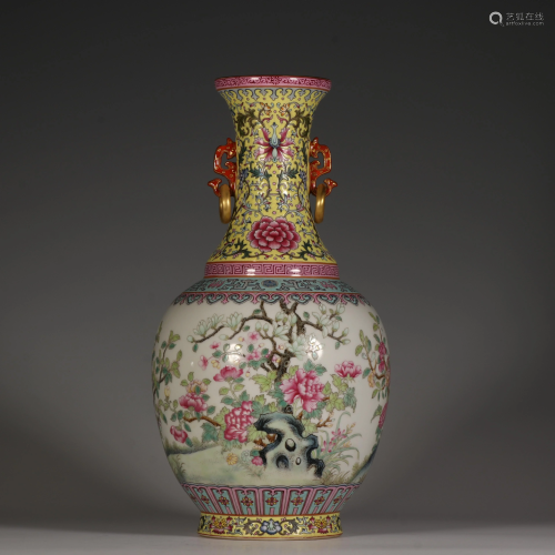 A enamel and floral double-eared vase made