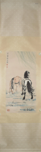 A Chinese scroll depicting a pair of horses