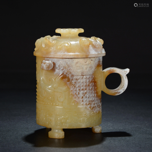 A Chinese russet jade carving of a cup and cover