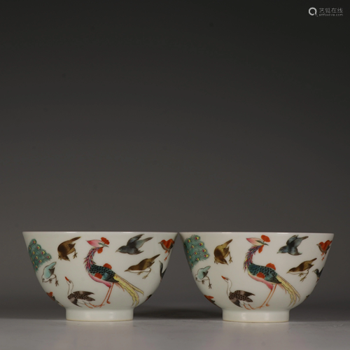 A pair of famille rose bowls with a hundred birds and